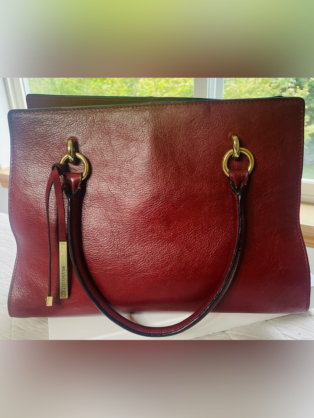 Wilsons Leather Burgundy Satchel with Gold colored hardware.